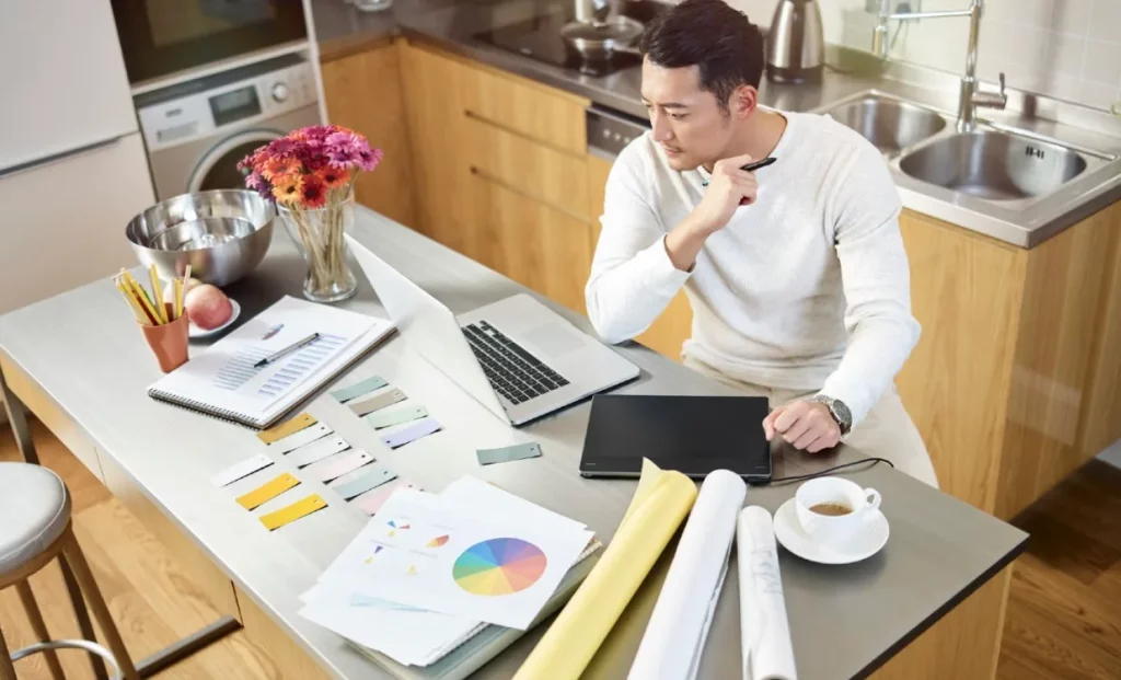 a person while starting a new online business in his home