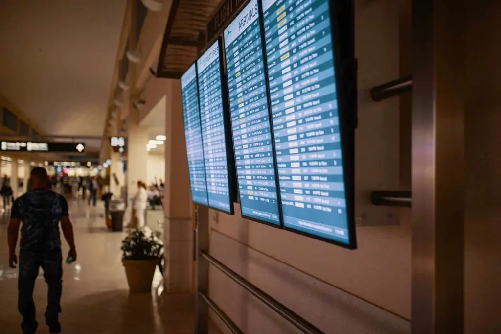 international flight schedule display at the airport